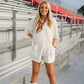 Cue the Charm Cream Romper