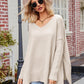 V-Neck Slit Exposed Seam Sweater